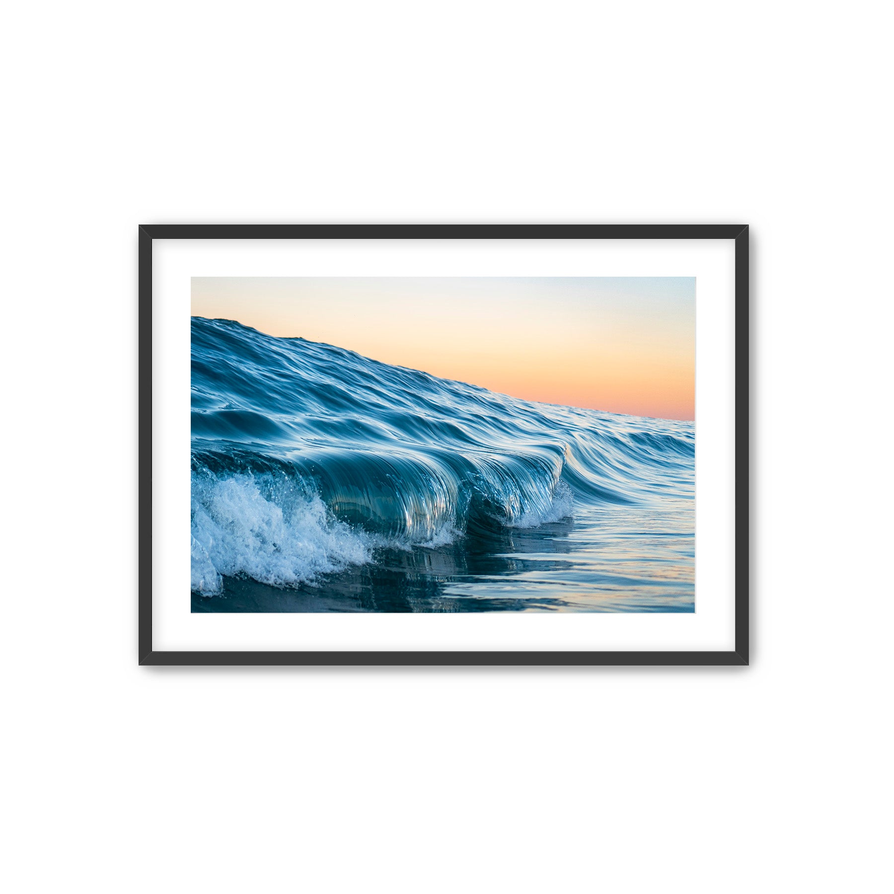Framed photograph of a wave at Tamarack beach.
